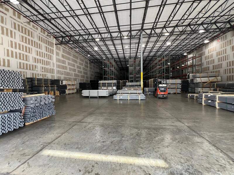 3PL Prime warehouse interior — high-bay racking, polished concrete floors, LED lighting, Medley FL
